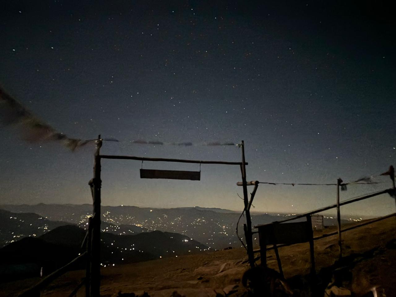 Chai break with snow-capped Himalayan peaks behind